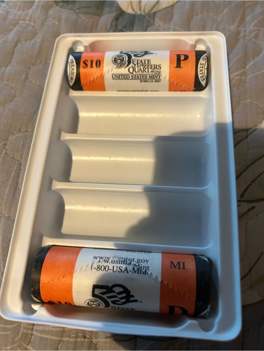 United States Mint State Quarters Coin Rolls in White Tray from Michigan. P & D